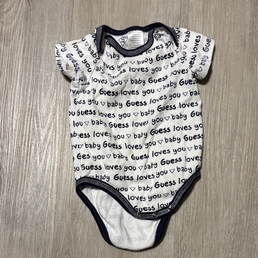 Guess Baby Bodysuit in White with Black Print